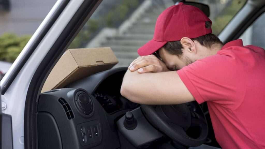 chauffeur livreur épuisé