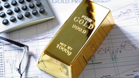 Achat d’or : comment comprendre les notions de prime, cours et pureté ? lingot d'or chiffres marche
